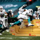 Football player dives onto Quesofa